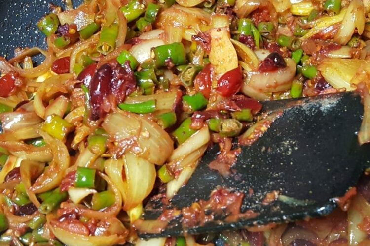 Spicy cranberry recipe with fresh cranberries, onion, green chilli, and Indian spices