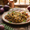 Baingan Ka Bharta Recipe served in a bowl with roasted eggplant, fresh coriander, and Indian spices.