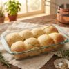 “Soft homemade bread rolls served fresh from oven”