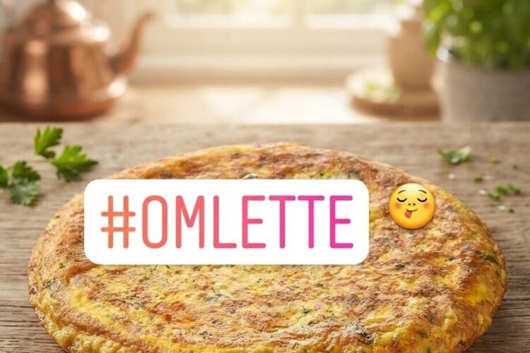 Fluffy omelette recipe with onions, tomatoes, green chilli, and fresh herbs served on a white plate