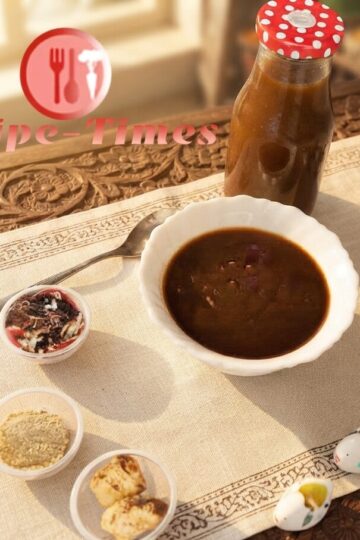 Homemade tamarind chutney recipe made with dates, jaggery, and Indian spices served in a bowl