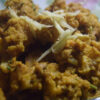 Masala Gobhi curry made with cauliflower, potatoes, tomatoes, and Indian spices served in a traditional bowl